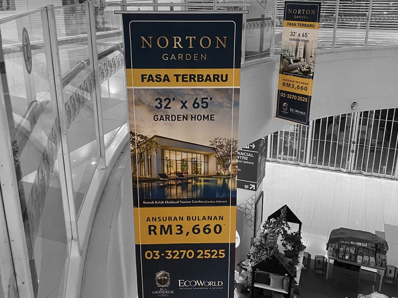 EcoWorld Norton Garden hanging banner in AEON Mall advertising new phase garden homes with RM3,660 monthly installments.